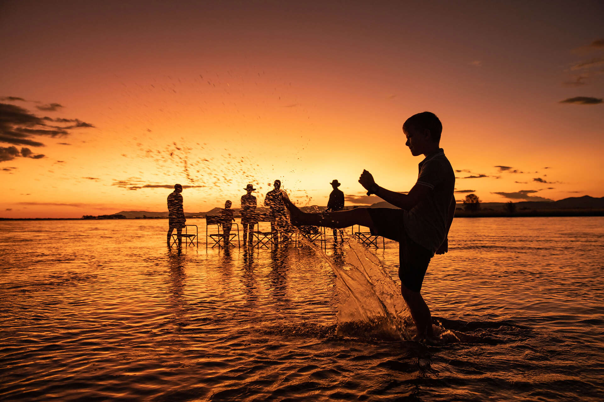12Great-Plains-Tembo-Plains-Camp-river-sundowners.jpg