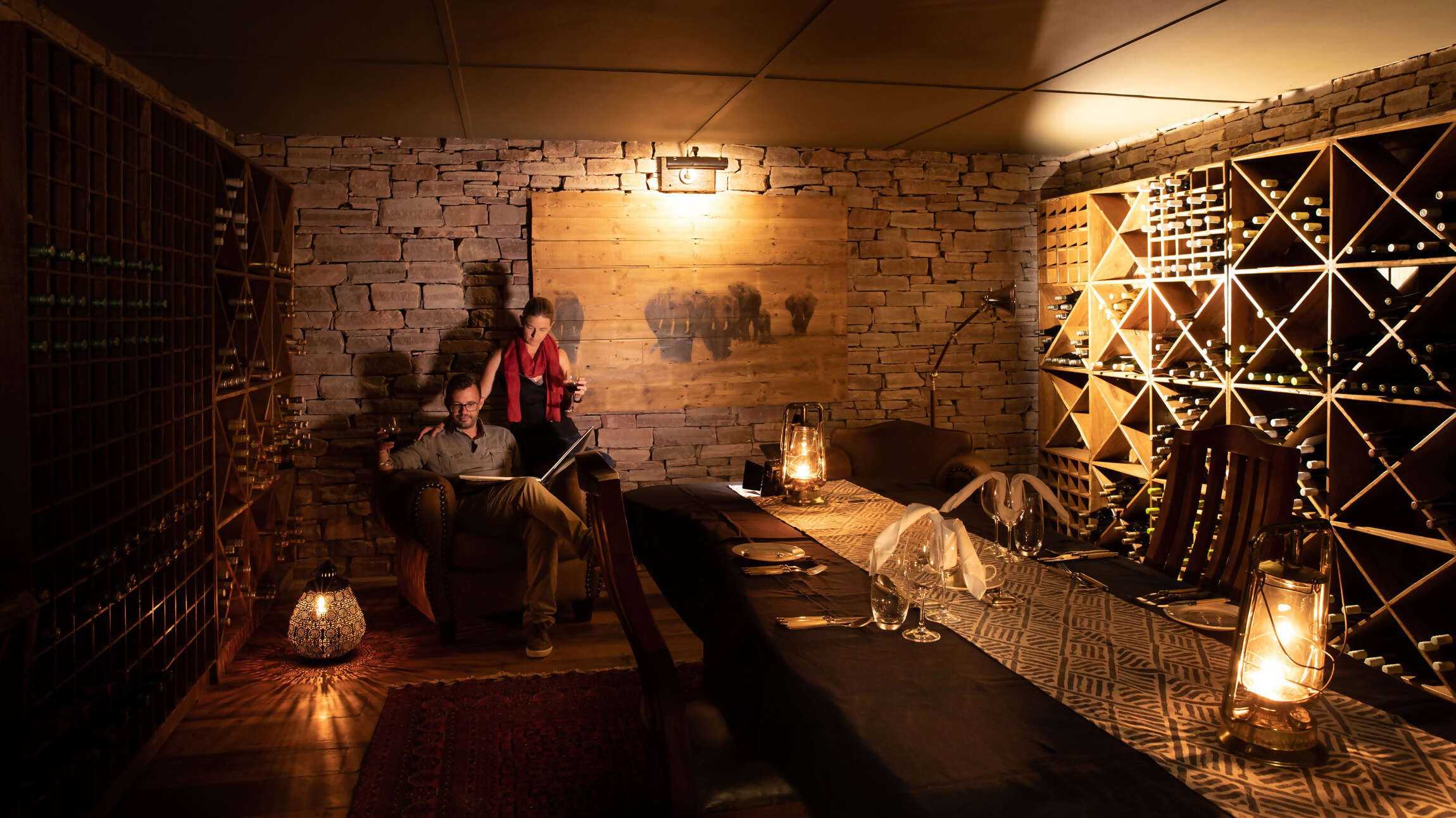 15Great-Plains-Tembo-Plains-Camp-wine-cellar-with-guests.jpg
