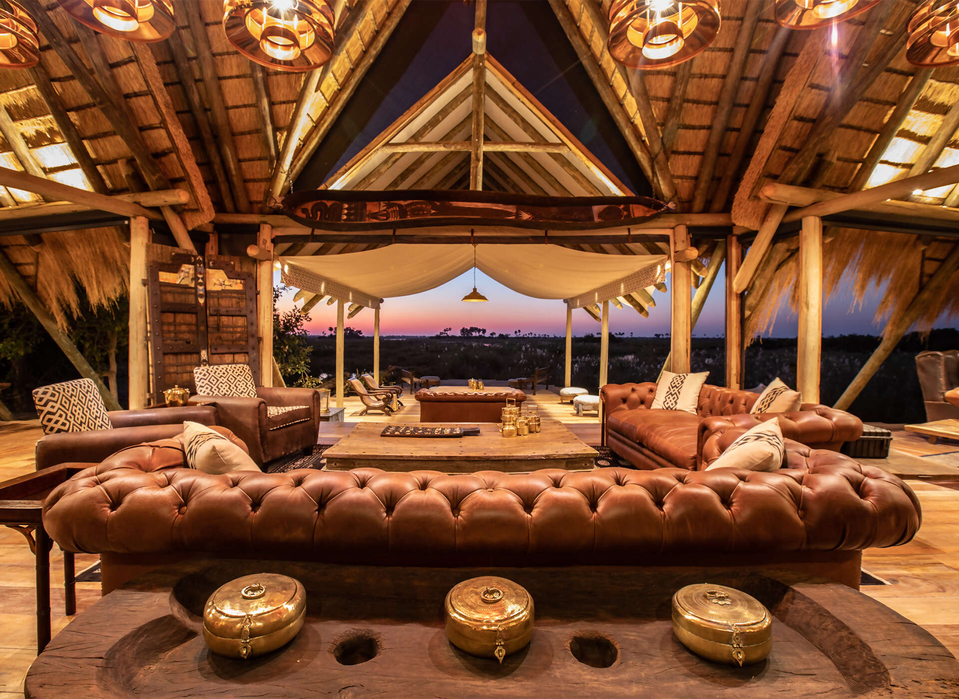Great-Plains-Selinda-Camp-Main-Lounging-area-at-sunset-.jpg