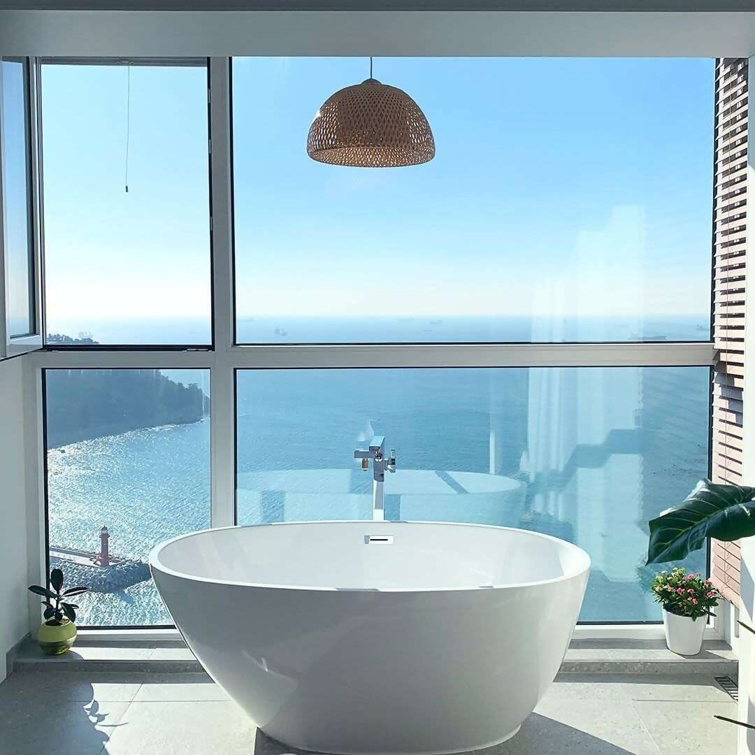 Superhost Jay’s elegant apartment is perched on the coast of Yeong-do, the island that forms one corner of the city
