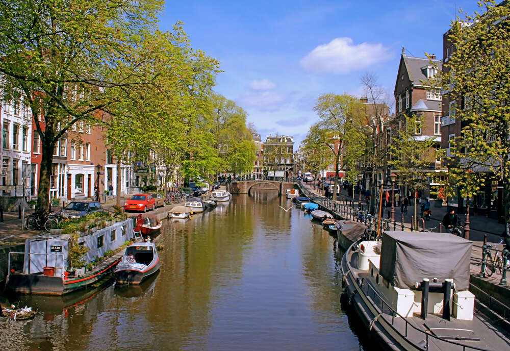 A Journey through the Netherlands, Belgium & France: Canals, Champagne & Culture featuring the Keukenhof Tulip Gardens